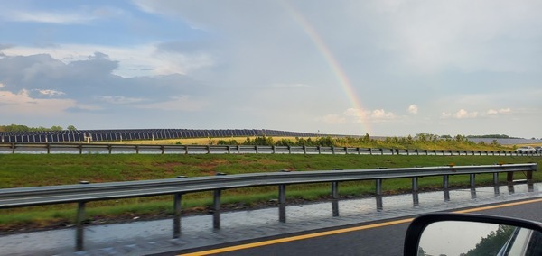 [Rainbow solar hill]