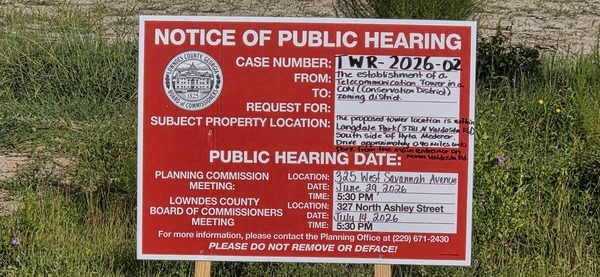 Public Hearing sign on Hyta Mederer Drive, 2026:07:11 08:44:21, 30.8872157, -83.3165918