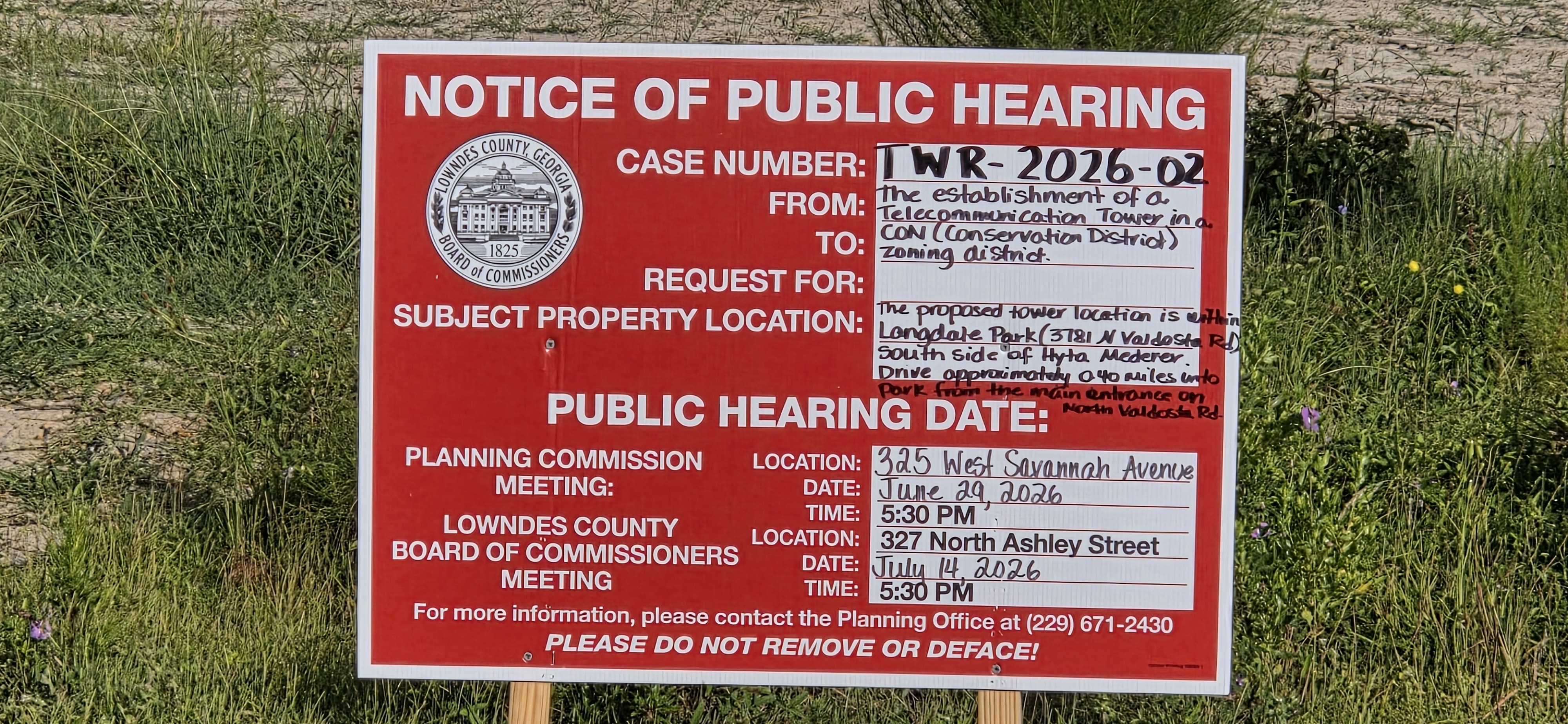 Public Hearing sign on Hyta Mederer Drive, 2026:07:11 08:44:21, 30.8872157, -83.3165918